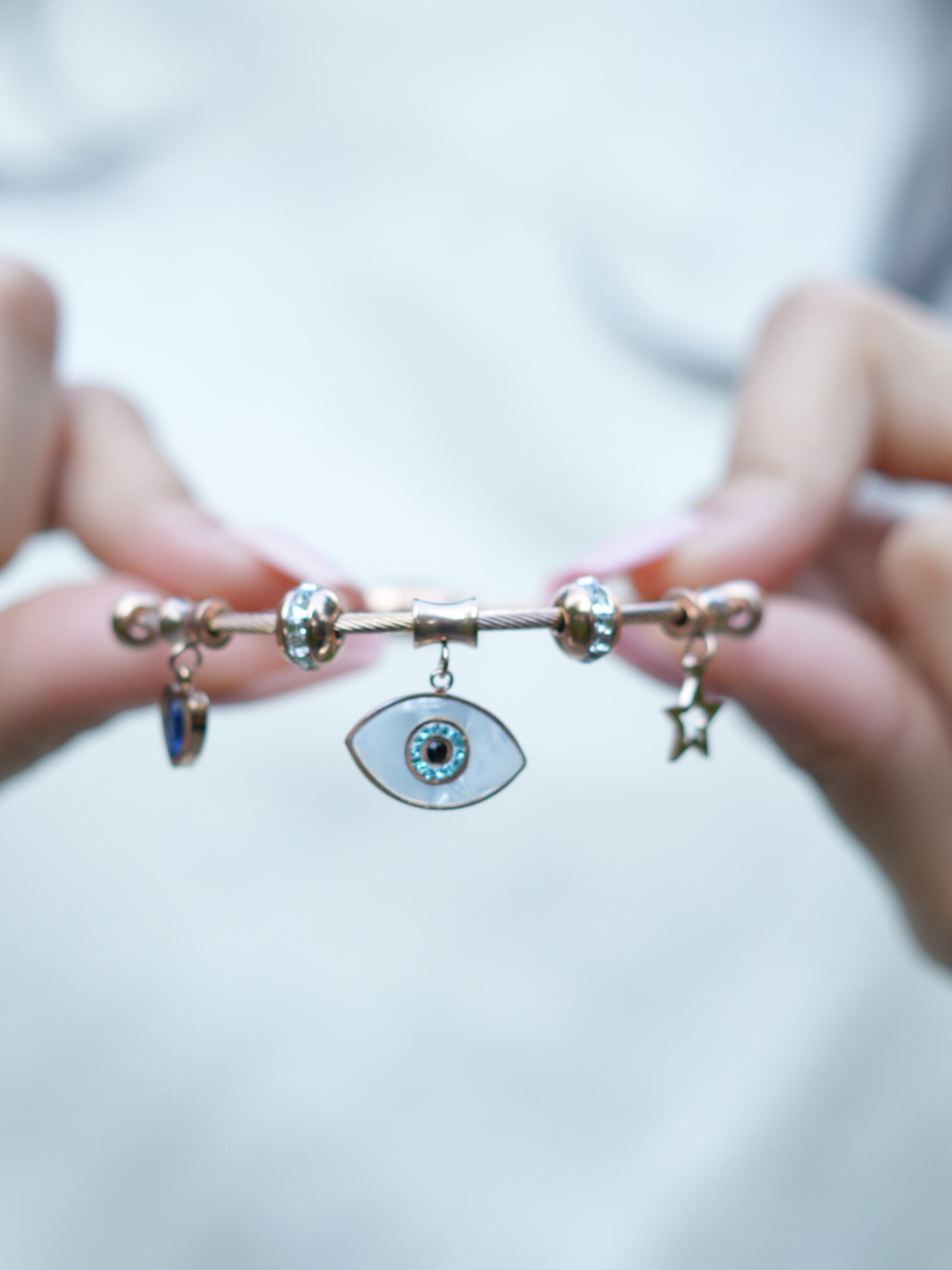 Angelina's evil best sale eye necklace