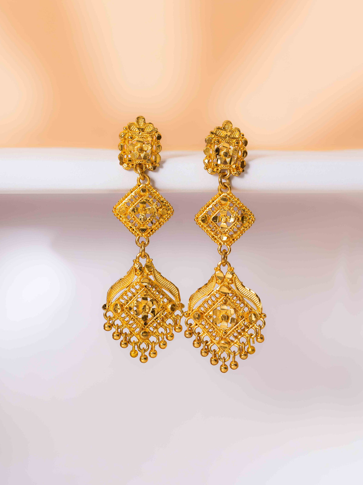 Yashasvi Long Gold Earrings