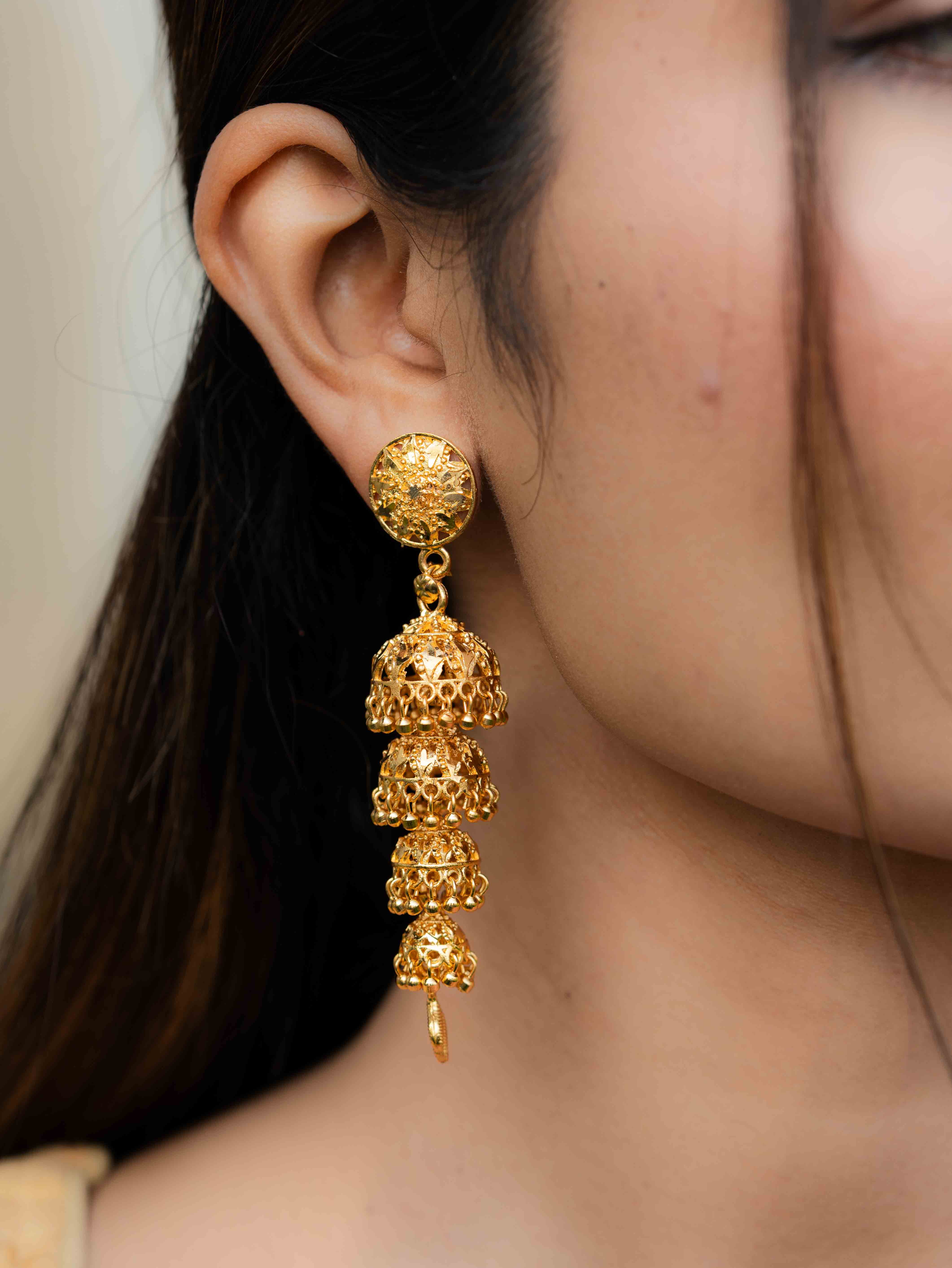 Hemanika Long Gold Earrings